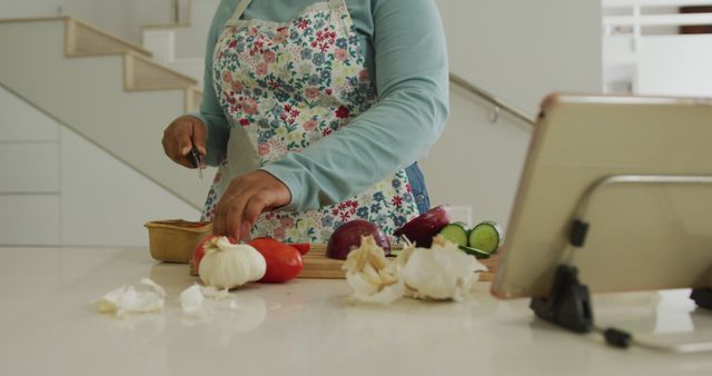 Woman Preparing Vegetables in a Modern Kitchen Setting - Download Free Stock Images Pikwizard.com