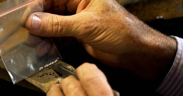 Jeweler Sorts Small Diamonds With Tweezers - Download Free Stock Images Pikwizard.com