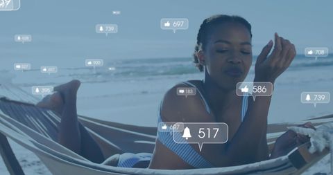 Joyful woman relaxing on beach with social media reactions overlay