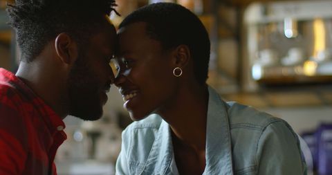 Happy African American Couple in Intimate Embrace at Home