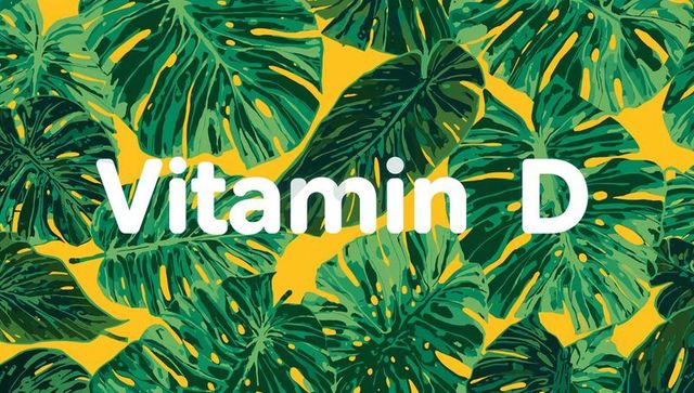 Vitamin d lettering over tropical monstera leaf pattern on vibrant yellow background