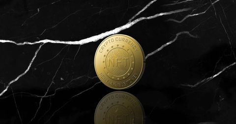 Spinning Gold NFT Coin on Luxurious Black Marble Surface