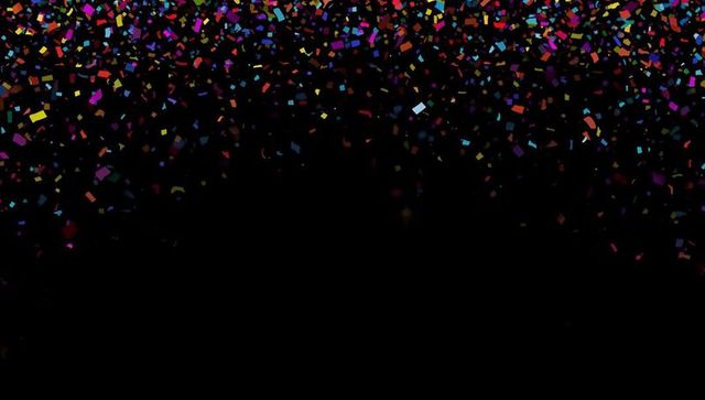 Multicolored Vibrant Confetti Falling on Black Background
