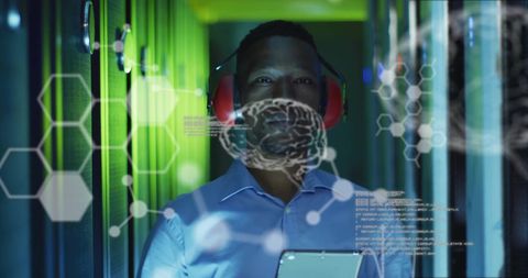 african american businessman analyzing data in advanced server room - Download Free Stock Images Pikwizard.com