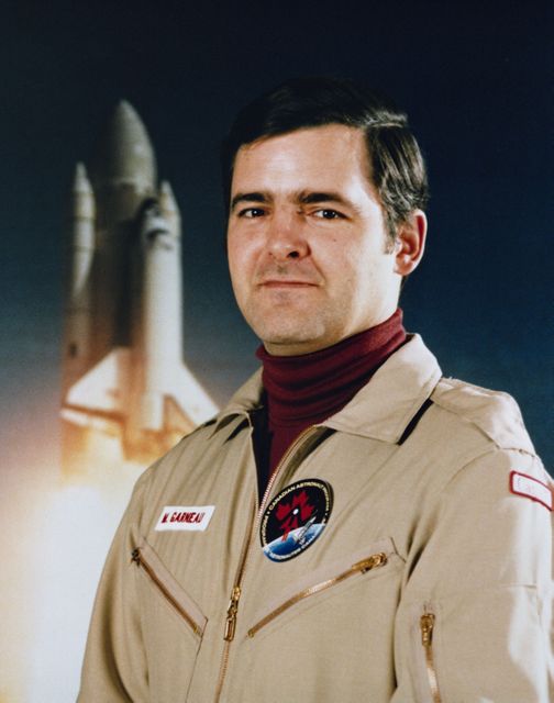 Portrait photograph, Canadian Payload Specialist Mark Garneau, assigned to the STS-16/41G Mission.    Also available in 4x5 B&W