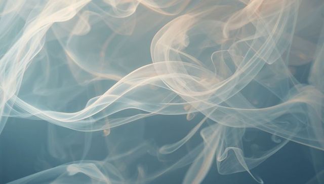 Ethereal wispy smoke ribbons drifting across teal gradient with warm golden highlights