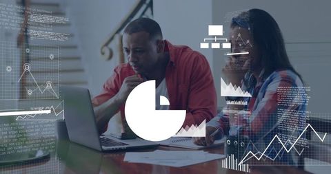 Colleagues collaborating while analyzing financial charts and data visualizations on laptop