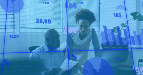 Diverse Colleagues Analyzing Statistical Data in Office