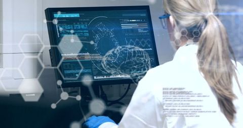 Female Scientist Analyzing Data on High-Tech Computer Interface - Download Free Stock Images Pikwizard.com