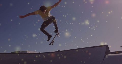 Daring Skateboarder Performing Trick at Busy Skatepark