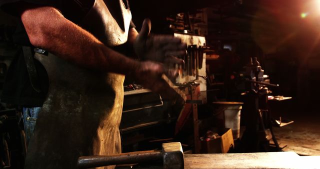 Blacksmith Working in Workshop with Hammer on Anvil - Download Free Stock Images Pikwizard.com