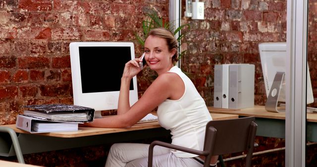 Confident Professional Woman Working in Modern Office Space - Download Free Stock Images Pikwizard.com