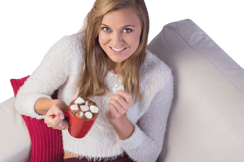 Smiling blonde woman relaxing with hot chocolate transparent background