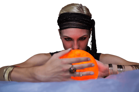 mysterious fortune teller gazing into illuminated orb on transparent background - Download Free Stock Videos Pikwizard.com