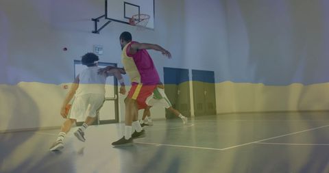 Diverse Basketball Players with Ukraine Flag Overlay