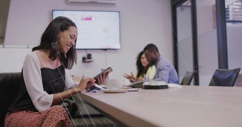 Professionals Collaborating in Modern Office Conference Room