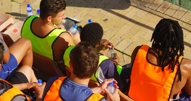 Athletes Resting and Hydrating During Soccer Practice - Download Free Stock Images Pikwizard.com