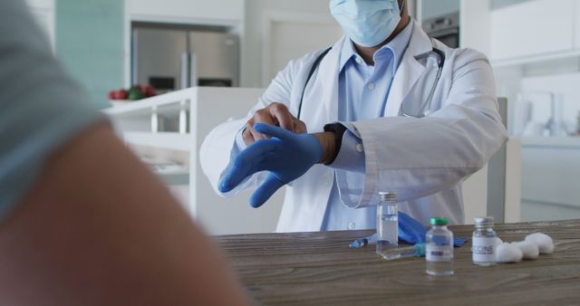 Doctor Preparing for Medical Procedure with Protective Gloves - Download Free Stock Images Pikwizard.com