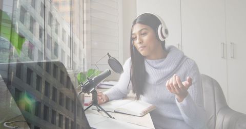 Businesswoman Recording Podcast with Urban Double Exposure Effect - Download Free Stock Images Pikwizard.com