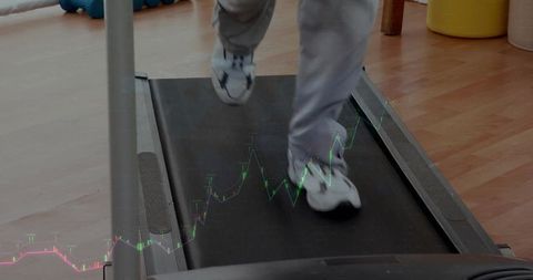Walking on treadmill with fitness data overlay in home gym