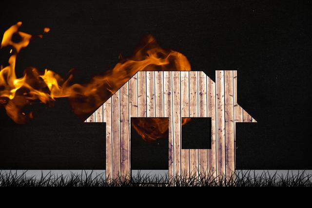 Wooden house structure burning with flames on a black background conveys danger and destruction. Useful for illustrating fire safety warnings, emergency preparedness materials, or fire disaster prevention content.
