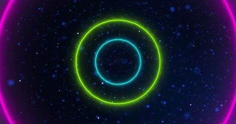 Vivid Neon Circles with Floating Blue Lights and Digital Elements