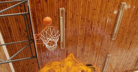 Basketball Thrilling Score Moment in Indoor Sports Gym