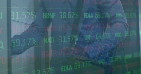 Financial Data and Businessman Analyzing Stock Market Trends