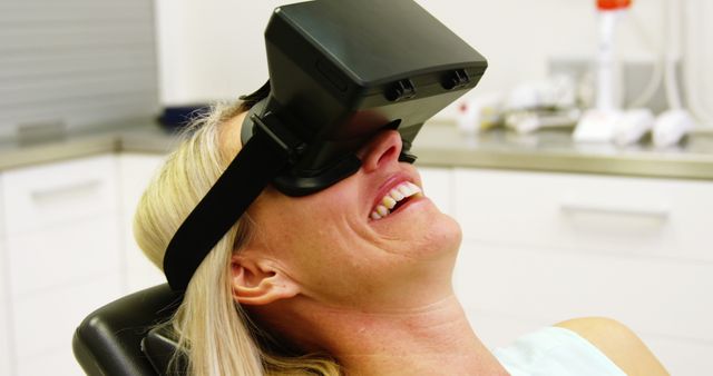 Woman using virtual glasses in dental clinic 4k