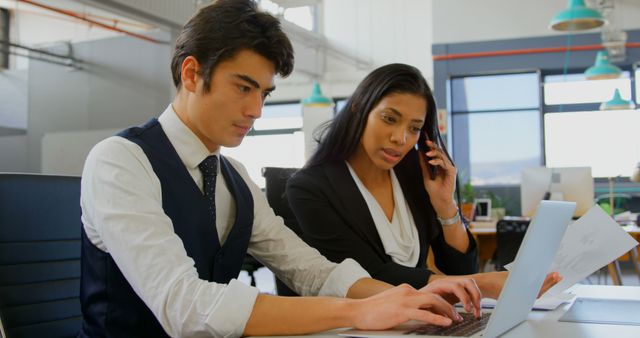 Business Team Collaborating in Modern Office Setting with Laptops - Download Free Stock Images Pikwizard.com