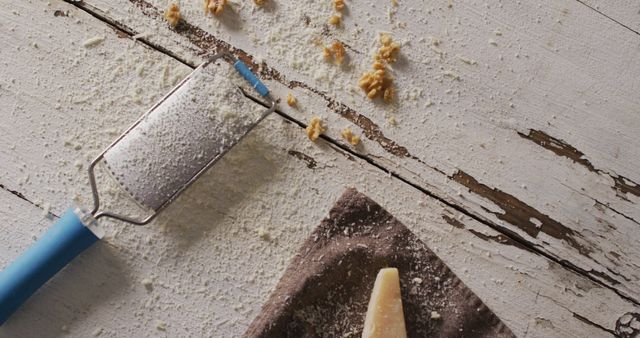 Grated Cheese and Grater on Rustic Wooden Table - Download Free Stock Images Pikwizard.com