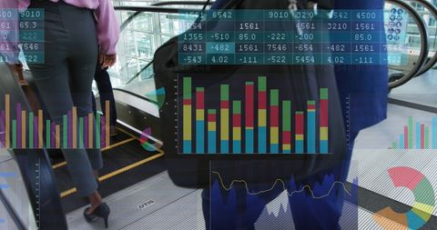 Business Professionals Analyzing Data Charts in Office Setting