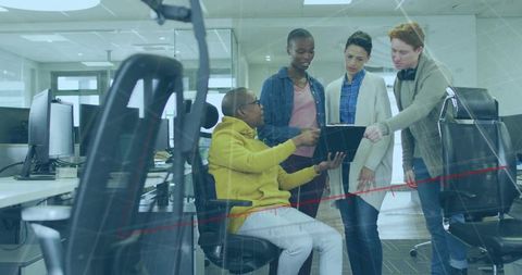 Dynamic Office Team Collaborating on Digital Project