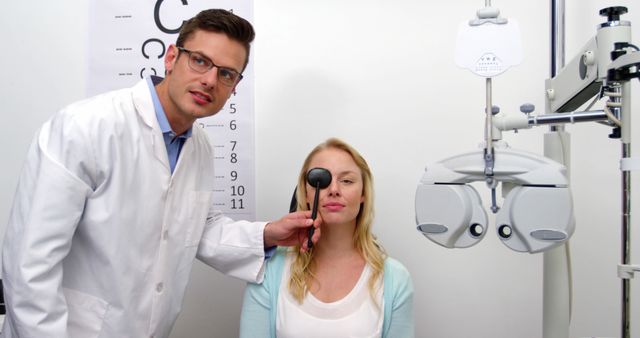 Optometrist Conducting Eye Examination in Modern Clinic - Download Free Stock Images Pikwizard.com