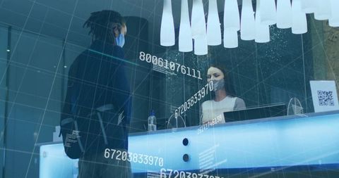 Modern hotel reception with digital overlay and safety measures