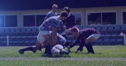 Dynamic Rugby Match in Action under Stadium Lights