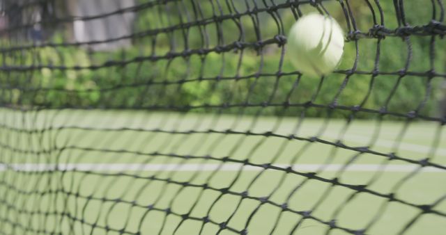 Tennis Ball Hitting Net on Outdoor Court - Download Free Stock Images Pikwizard.com