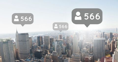 Social Media Icons Above Modern City Skyline