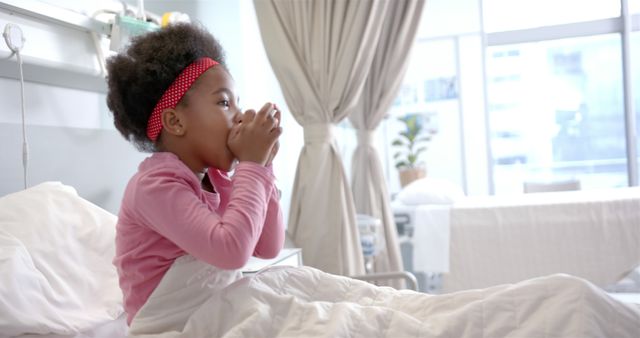 Sick African American Girl Holding Mug in Hospital Bed - Download Free Stock Images Pikwizard.com