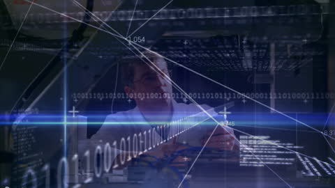 Man Analyzing Data with Digital Overlays in Workshop Environment