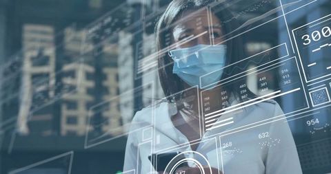 Businesswoman Analyzing Futuristic Holographic Data in Office