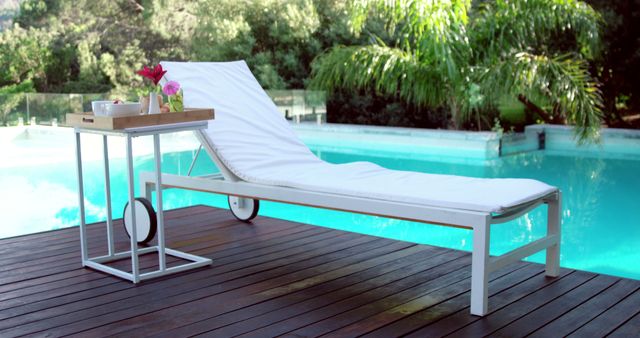 Modern Outdoor Lounge Chair by Pool with Refreshments - Download Free Stock Images Pikwizard.com