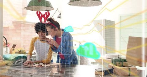 Festive cookie decorating and smartphone styling on kitchen island with antler headband