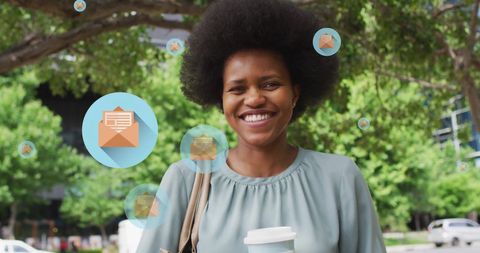 Smiling African American Woman with Digital Communication Overlay in Park
