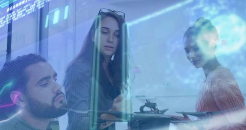 Team inspecting drone prototype with holographic overlays in modern tech workspace