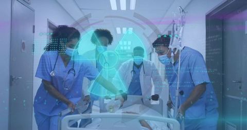 Medical team transporting emergency patient in hospital for urgent care