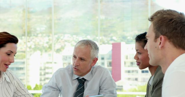 Diverse Business Team In Discussion At Modern Office Meeting Room - Download Free Stock Images Pikwizard.com