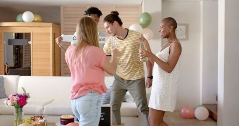 Joyful Gathering Celebrating New Job With Cake and Friends