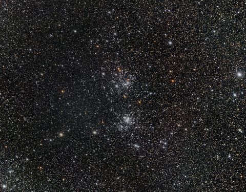 Dense stellar field with vivid stars in universe night sky
