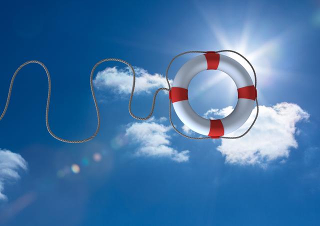 Lifebuoy with rope floating against a sunny blue sky. Ideal for illustrating safety, rescue, and emergency services. Suitable for use in maritime safety publications, insurance advertisements, and outdoor activity promotions.